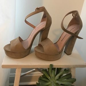 Never worn before, platform sandal.